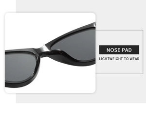 Close-up of integrated nose pads on black cat-eye sunglasses for lightweight comfort