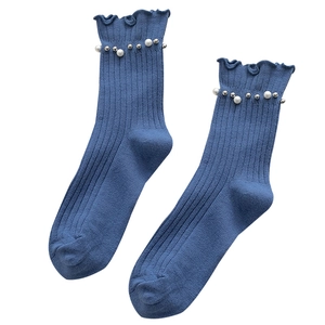 Blue ribbed cotton mid-calf socks with ruffle trim and pearl stud embellishments