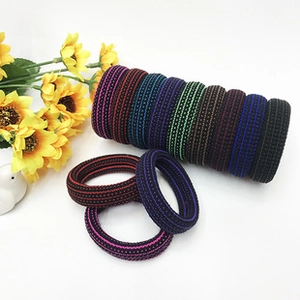 Detailed view of colorful high-elastic nylon hair ties with a soft woven texture