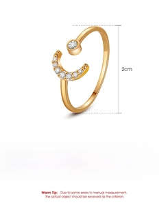 Detailed view of adjustable gold moon ring with micro-pave crystals weighing 0.97g