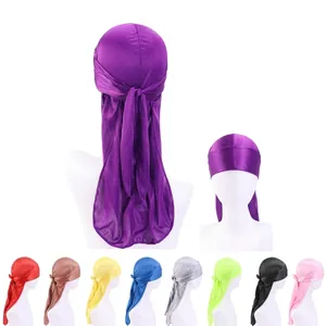 Detail showing various colors of satin durag headwraps with long tail design for custom logo