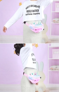 Detail showing the adjustable pink strap and zipper of the plush unicorn fanny pack