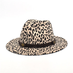 Detail of leopard print fedora hat featuring brown leather band and gold metal rivets