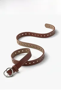 Detail of brown leather belt with heart-shaped buckle and hollow heart-shaped holes