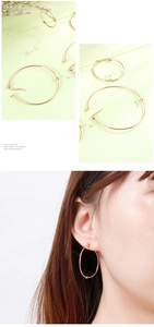Detail showing oversized rose gold knot hoop earrings with hook closure for daily wear
