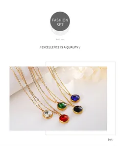Detailed view of 5-piece round crystal pendant set in red, green, blue, black, and clear