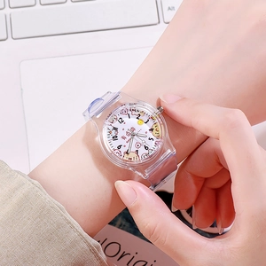 Macro shot of transparent PVC cartoon watch dial with colorful patterns and numerals