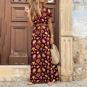 Detail of bohemian V-neck floral maxi dress with vintage paisley print in burgundy