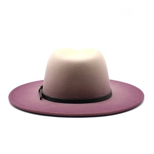Detail of gradient felt fedora hat with a stylish black leather belt buckle accent