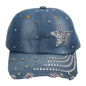 Detail of distressed denim baseball cap with rhinestone star pattern and metal studs