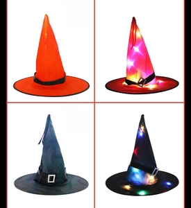 Detail of black and orange LED glowing witch hats with silver buckles for Halloween party decor