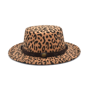 Close-up of leopard print flat top wool hat with brown leather band and metal buckle