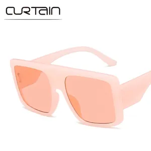 Oversize retro square frame sunglasses in peach pink finish with matching tinted lenses
