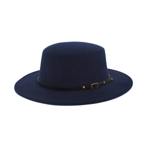 Detail of dark blue felt hat featuring a black leather band with gold metal buckle