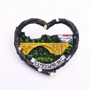 Macro shot of 3D embossed heart resin fridge magnet featuring Luxembourg city landscape