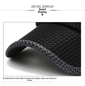 Detail of black mesh sun hat brim featuring breathable honeycomb fabric and sturdy stitching