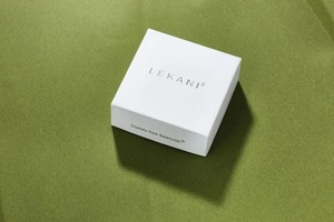 Close-up of a white premium jewelry gift box featuring the brand name LEKANI