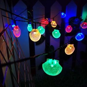 Solar powered seashell LED string lights for outdoor garden and patio holiday decoration