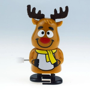 Close-up of wind-up reindeer toy with brown body, yellow scarf, and white mechanical knob
