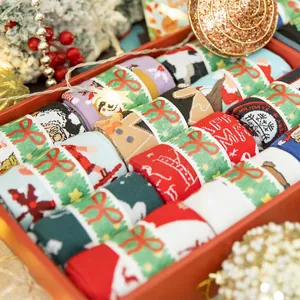 Holiday gift box with 12 pairs of Christmas cotton socks featuring Santa and reindeer