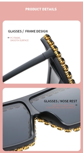 Detail shot of black oversized sunglasses frame featuring gold rhinestones on PC temple