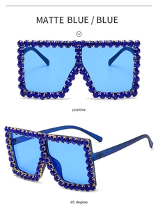 Detailed views of matte blue oversized sunglasses featuring dense blue rhinestone accents