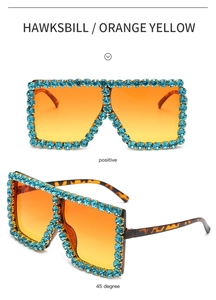 Front and 45-degree views of oversized tortoise sunglasses with blue rhinestones