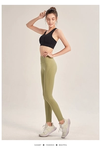 Seitenansicht der olivgrünen Yoga-Hose mit hoher Taille und schwarzem Sport-BH