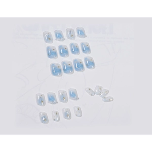 Blue ocean shell pearl press-on nails with gold foil accents and marble texture design