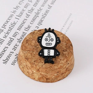 Classic childhood nostalgic tin frog style robot enamel brooch with black white finish