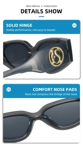 Detail of dark gray cat eye sunglasses showing solid hinges and comfortable nose pads