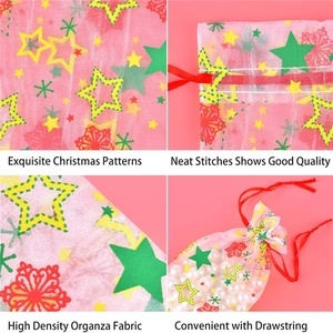 Detail view of Christmas organza bags with gold patterns, stitching and red drawstring