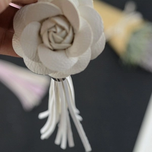 Elegant white PU leather camellia flower keychain with tassel for handbags and car keys