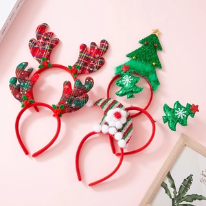 Christmas headband set featuring plaid antlers and sequin tree on a soft pink background