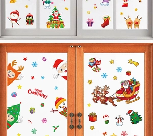 Close-up of Santa and reindeer Christmas window static clings on wooden frames
