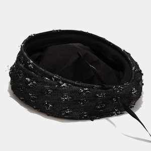 Classic black tweed beret for women featuring silver shimmer threads and fringe details