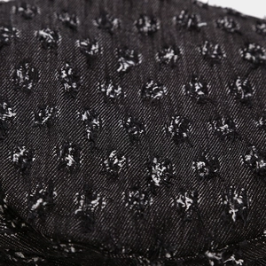 Black washed distressed denim beret with vintage tufted polka dots and twill texture