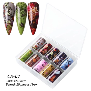 Halloween nail art transfer foils set with 10 rolls of spooky patterns in a storage box