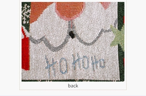 Detailed back view showing premium knit texture and HO HO HO pattern on Christmas placemat
