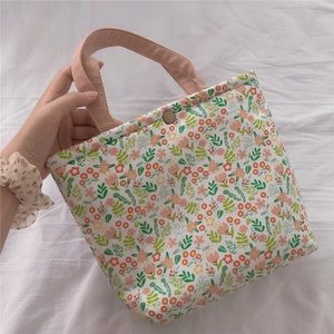 Floral canvas lunch bag with pink handle and insulated lining for women and moms