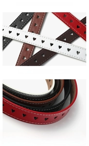 Detailed macro view showing the smooth leather texture and nylon stitching of the heart belt