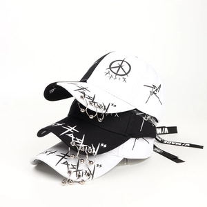 Streetwear baseball caps with graffiti prints, metal rings, and long fashion ribbons