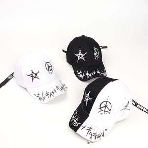 Hip-hop baseball caps with metal rings and graffiti stars in black and white styles