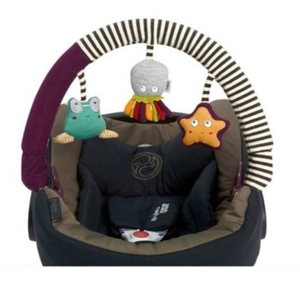 Detail of baby stroller arch toy featuring plush frog, octopus and starfish hanging ornaments