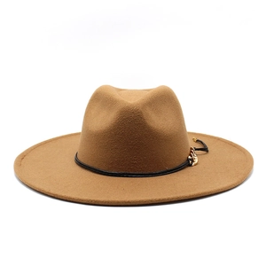 Detail of camel wool felt fedora hat with elegant black band and gold chain accent