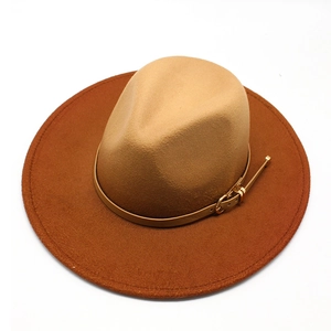 Detail of two-tone gradient fedora featuring a camel crown and wide mahogany brim with strap