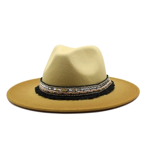 Bohemian two-tone fedora hat with wide brim, ethnic woven band and fringe details