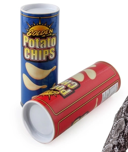 Macro detail of jump spring snake toy popping out from colorful potato chip cans