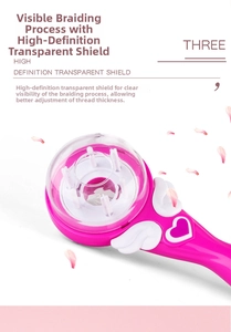 Close-up of electric hair braider with transparent shield and pink angel wing design
