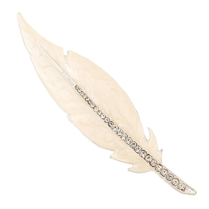 Elegant cream enamel feather brooch with sparkling rhinestone accents on white background